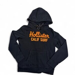 Hollister Co. Y2K black hoodie with orange 'Hollister CALIF SURF' text